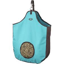 tough 1 hay bag with 8 inch hole group shot turquoise and brown