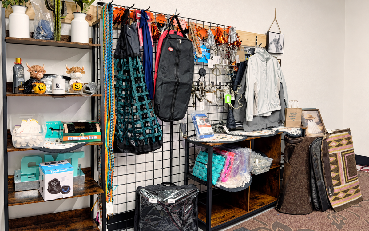 Tack, lead ropes, blankets and horse supplies displayed for a Spotted M Tack Facebook Live Sale.