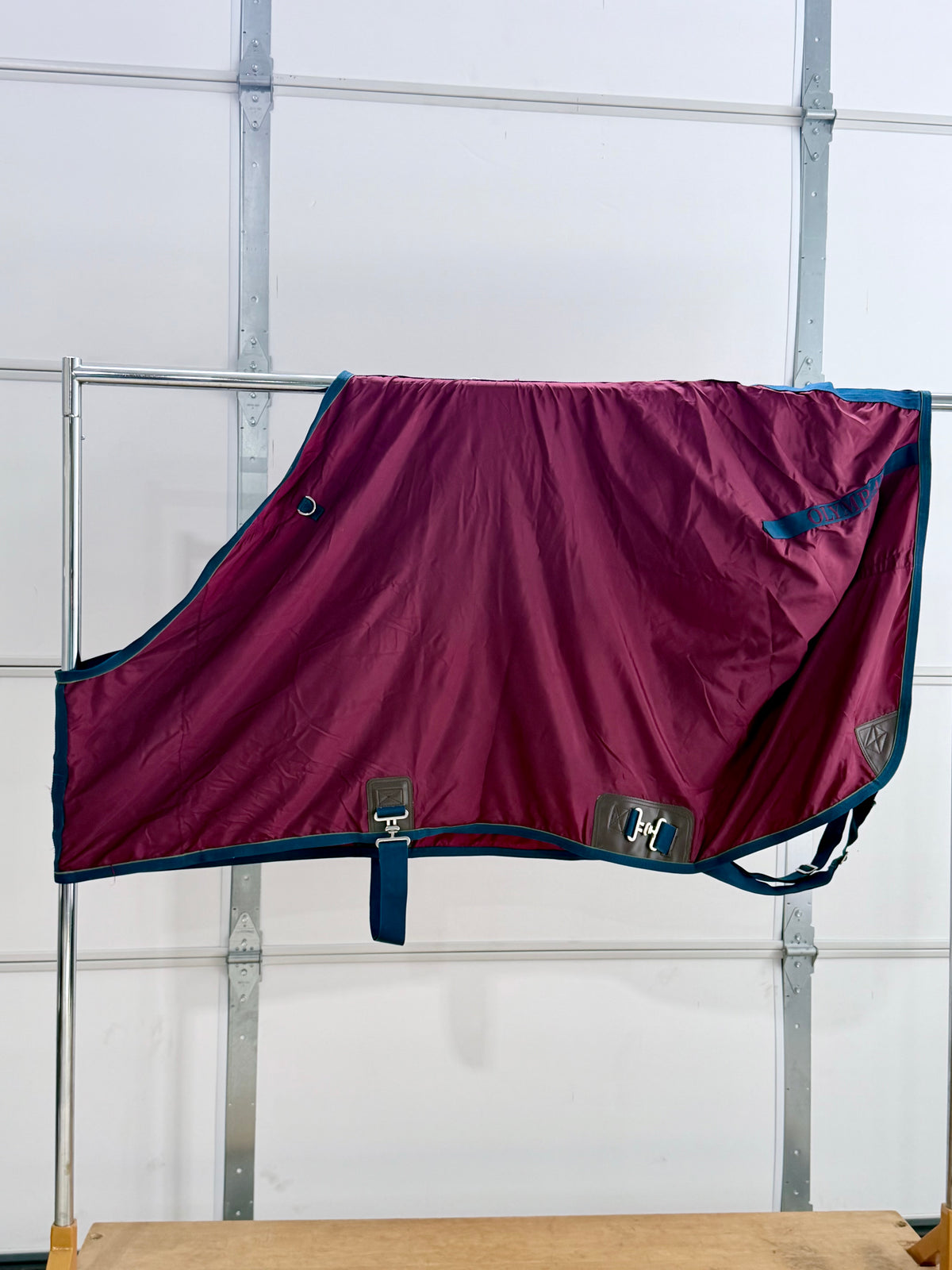 Used Olymplin Stable Sheet – Approximately 69–70” – Burgundy & Navy